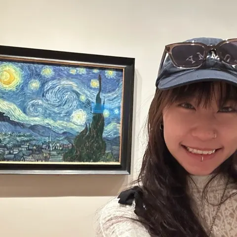 Beside Van Gogh’s The Starry Night