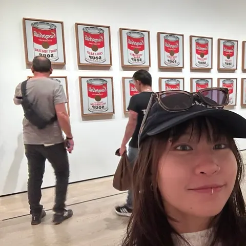 In front of Warhol’s Campbell’s Soup cans