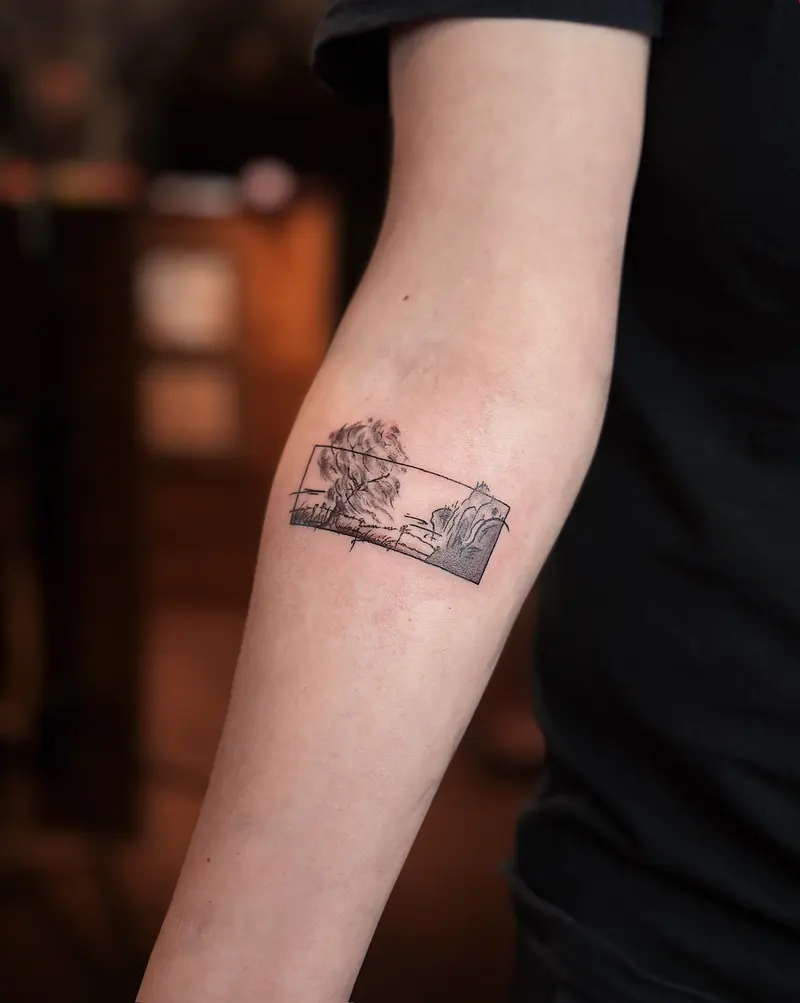 Tattoo work: a small framed landscape, on an inner arm